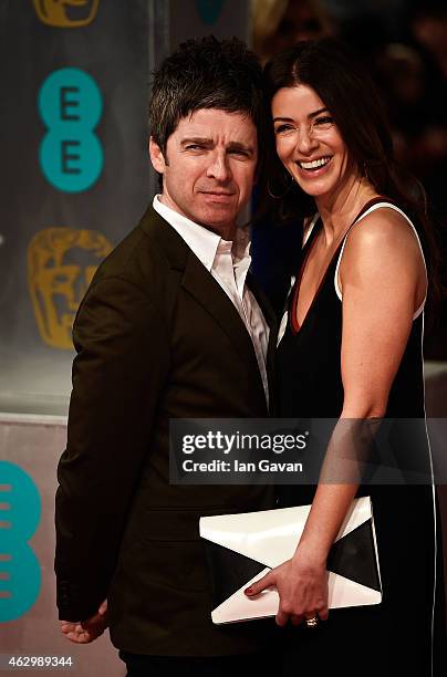 Noel Gallagher and Sara MacDonald attend the EE British Academy Film Awards at The Royal Opera House on February 8, 2015 in London, England.