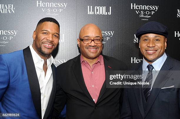 Michael Strahan, Hennessy Senior Vice President Rodney Williams and LL Cool J attend the Hennessy Toasts Achievements in Music on February 7, 2015 in...