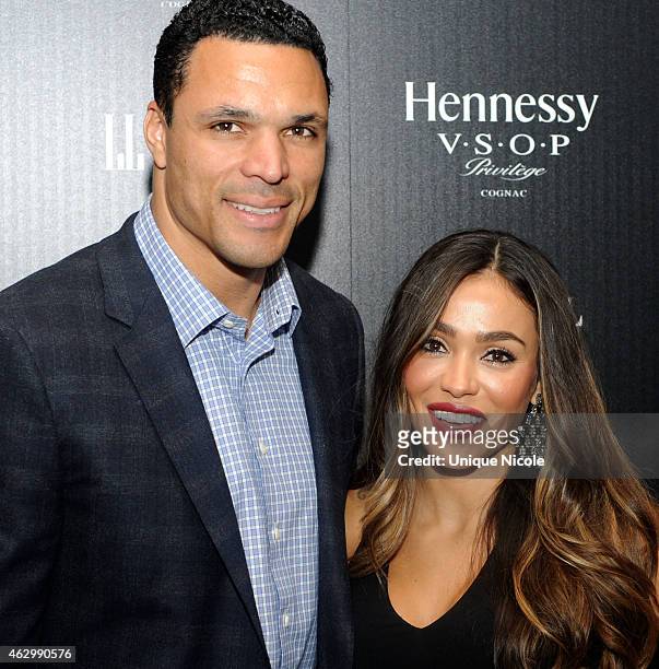Player Tony Gonzalez and October Gonzalez attend the Hennessy Toasts Achievements In Music on February 7, 2015 in Los Angeles, California.