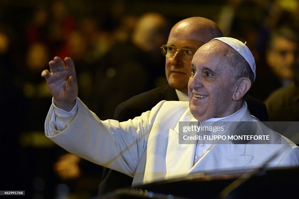 Pope In Italy Pope Francis waves to the crowd as he leaves after his pastoral visit ...