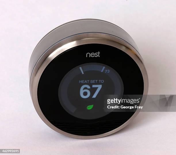In this photo illustration, a Nest thermostat is seen on January 16, 2014 in Provo, Utah. Google bought Nest, a home automation company, for $3.2...