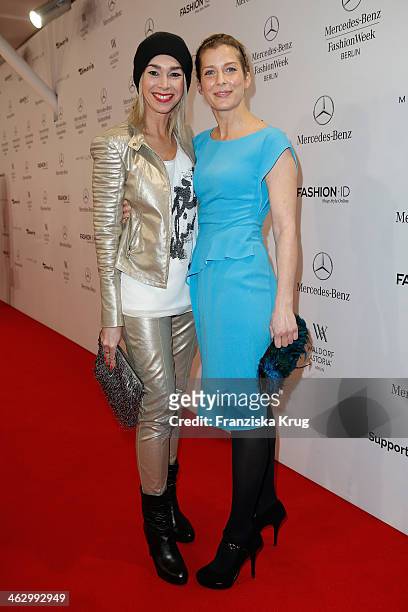 Valerie Niehaus and Kiki Viebrock attend the Laurel show during Mercedes-Benz Fashion Week Autumn/Winter 2014/15 at Brandenburg Gate on January 16,...
