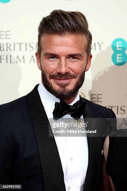 David Beckham poses in the winners room at the EE British Academy Film Awards at The Royal Opera House on February 8, 2015 in London, England.