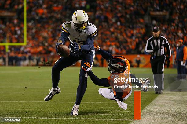 Keenan Allen of the San Diego Chargers scores a fourth quarter touchdown against Michael Huff of the Denver Broncos during the AFC Divisional Playoff...