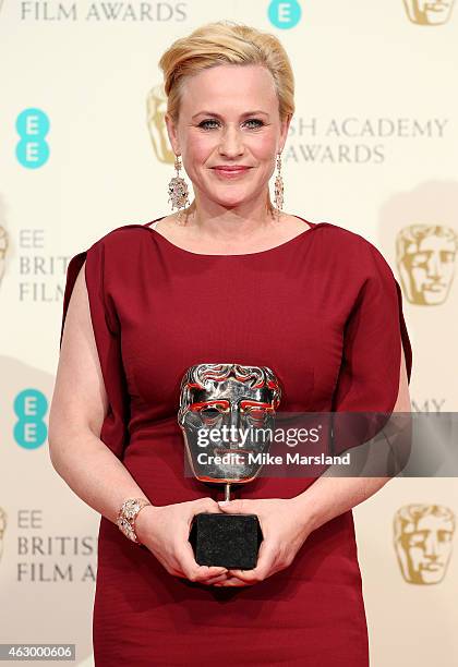 Patricia Arquette, winner of the Best Supporting Actress award, poses in the winners room at the EE British Academy Film Awards at The Royal Opera...