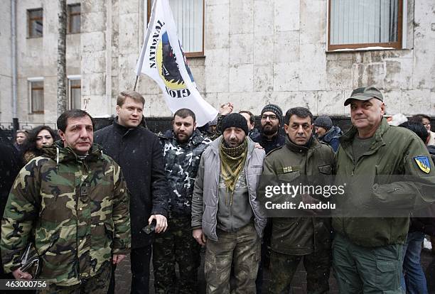 Ukrainian soldiers pose with the Georgian volunteers fighting against the pro-Russian separatists, in Kiev, Ukraine on February 08, 2015. Volunteers...