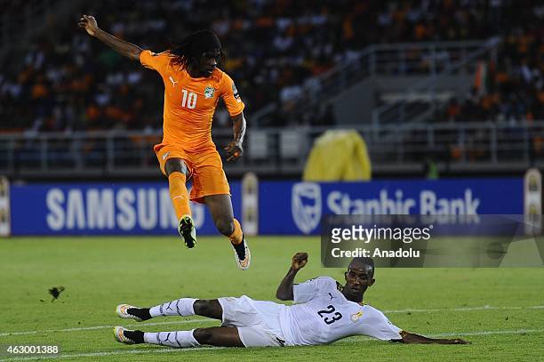 Kouassi Gervinho of Ivory Coast in action against Harrison Afful of Ghana during the Africa Cup of Nations final match between Ivory Coast and Ghana...