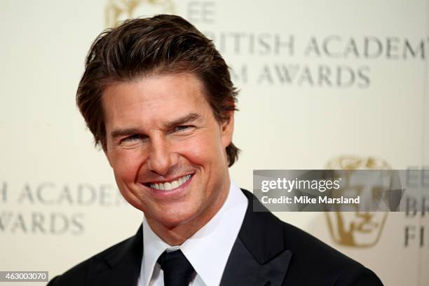 Actor Tom Cruise poses in the winners room at the EE British Academy Film Awards at The Royal Opera House on February 8, 2015 in London, England.