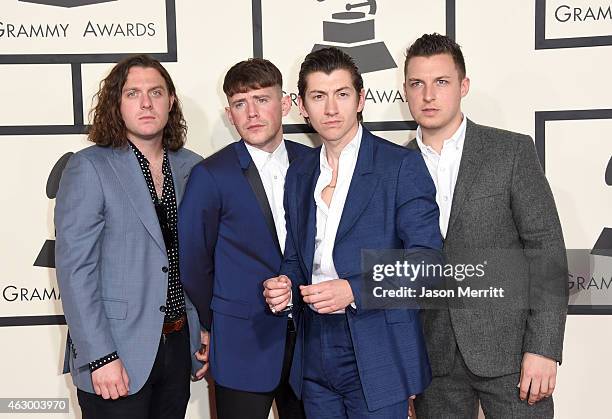 Musicians Nick O'Malley, Jamie Cook, Alex Turner, and Matt Helders of Arctic Monkeys attend The 57th Annual GRAMMY Awards at the STAPLES Center on...