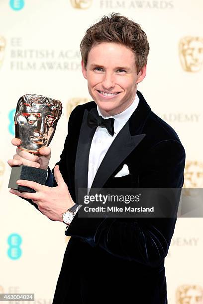 Actor Eddie Redmayne, winner of the Best Leading Actor award for 'The Theory Of Everything' poses in the winners room at the EE British Academy Film...