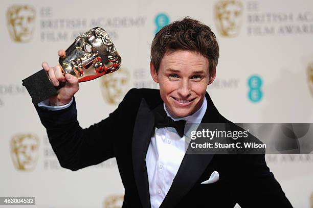 Eddie Redmayne poses in the winners room at the EE British Academy Film Awards at The Royal Opera House on February 8, 2015 in London, England.