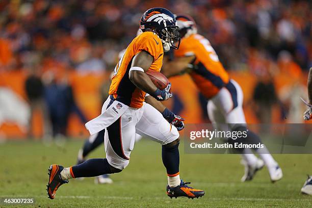 Trindon Holliday of the Denver Broncos carries the ball against the San Diego Chargers during the AFC Divisional Playoff Game at Sports Authority...