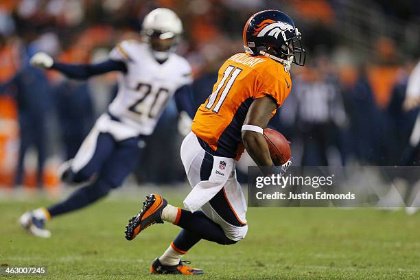 Trindon Holliday of the Denver Broncos carries the ball against the San Diego Chargers during the AFC Divisional Playoff Game at Sports Authority...