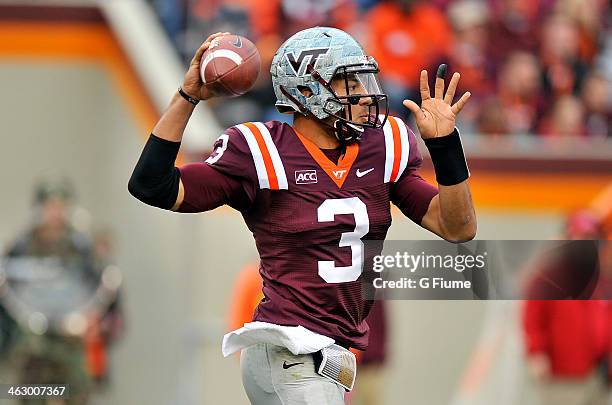 Logan Thomas of the Virginia Tech Hokies throws a pass against the Maryland Terrapins at Lane Stadium on November 16, 2013 in Blacksburg, Virginia.