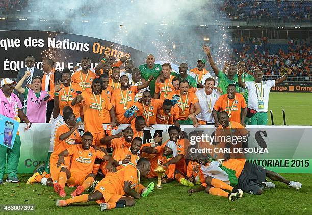 Ivory Coast's players celebrate after winning the 2015 African Cup of Nations final football match between Ivory Coast and Ghana in Bata on February...