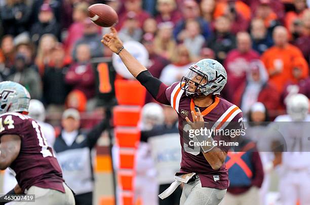 Logan Thomas of the Virginia Tech Hokies throws a pass against the Maryland Terrapins at Lane Stadium on November 16, 2013 in Blacksburg, Virginia.