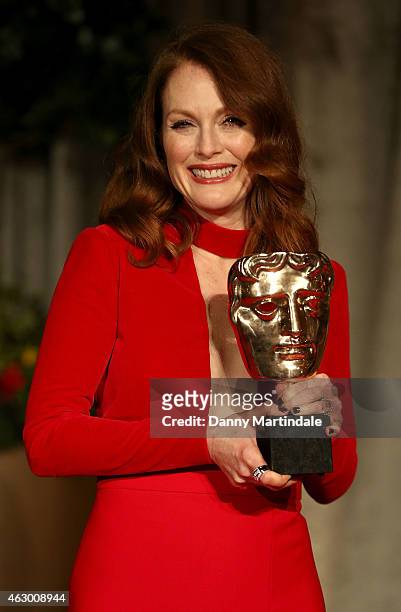 Julianne Moore with her winning BAFTA attends the after party for the EE British Academy Film Awards at The Grosvenor House Hotel on February 8, 2015...