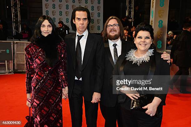Susie Bick, Nick Cave, Iain Forsyth and Jane Pollard attend the EE British Academy Film Awards at The Royal Opera House on February 8, 2015 in...