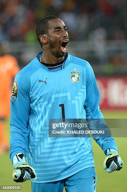 Ivory Coast's goalkeeper Boubacar Barry celebrates after scoring the winning penalty during the penalty shootout of the 2015 African Cup of Nations...