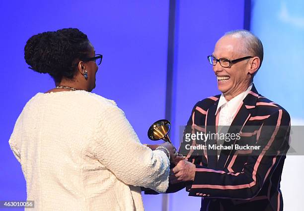 Singer Dianne Reeves accepts the award for Best Jazz Vocal Album from director John Waters onstage at the Premiere Ceremony during The 57th Annual...