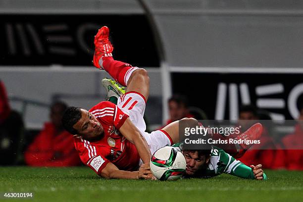 Benfica's forward Lima vies with Sporting's defender Tobias Figueiredo during the Primeira Liga match between Sporting CP and SL Benfica at Estadio...