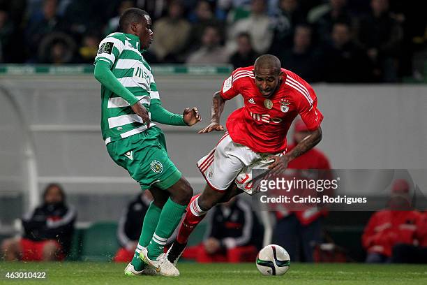 Sporting's midfielder William Carvalho tackles Benfica's midfielder Anderson Talisca during the Primeira Liga match between Sporting CP and SL...