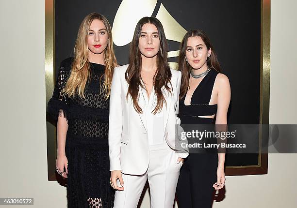 Este Haim, Danielle Haim and Alana Haim of Haim attend The 57th Annual GRAMMY Awards at the STAPLES Center on February 8, 2015 in Los Angeles,...