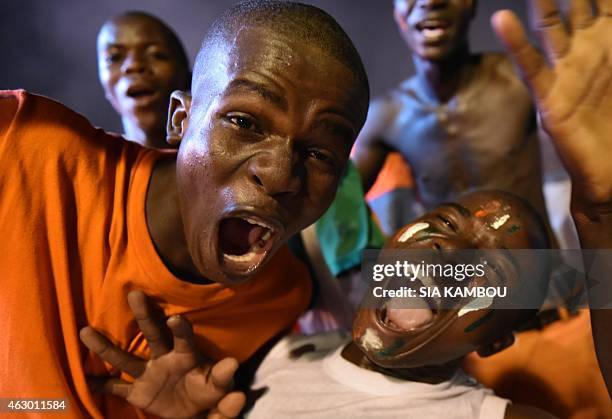 Ivory Coast football fans in Abidjan celebrate on February 8 after their national team won the Africa Cup of Nations. Ivory Coast faced Ghana in the...