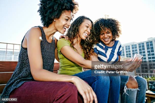 women taking self-portrait on urban rooftop - social media profile stock pictures, royalty-free photos & images