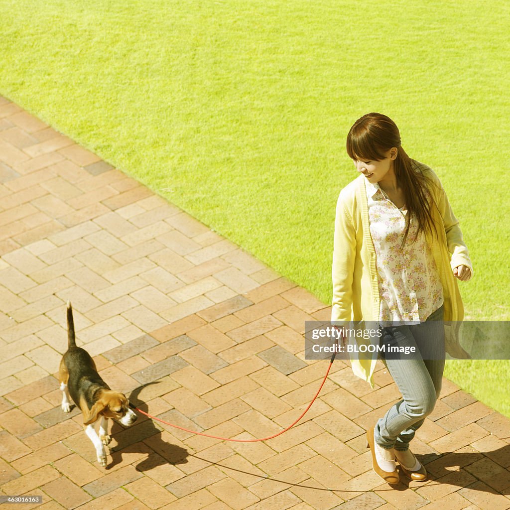 Woman Walking With Dog