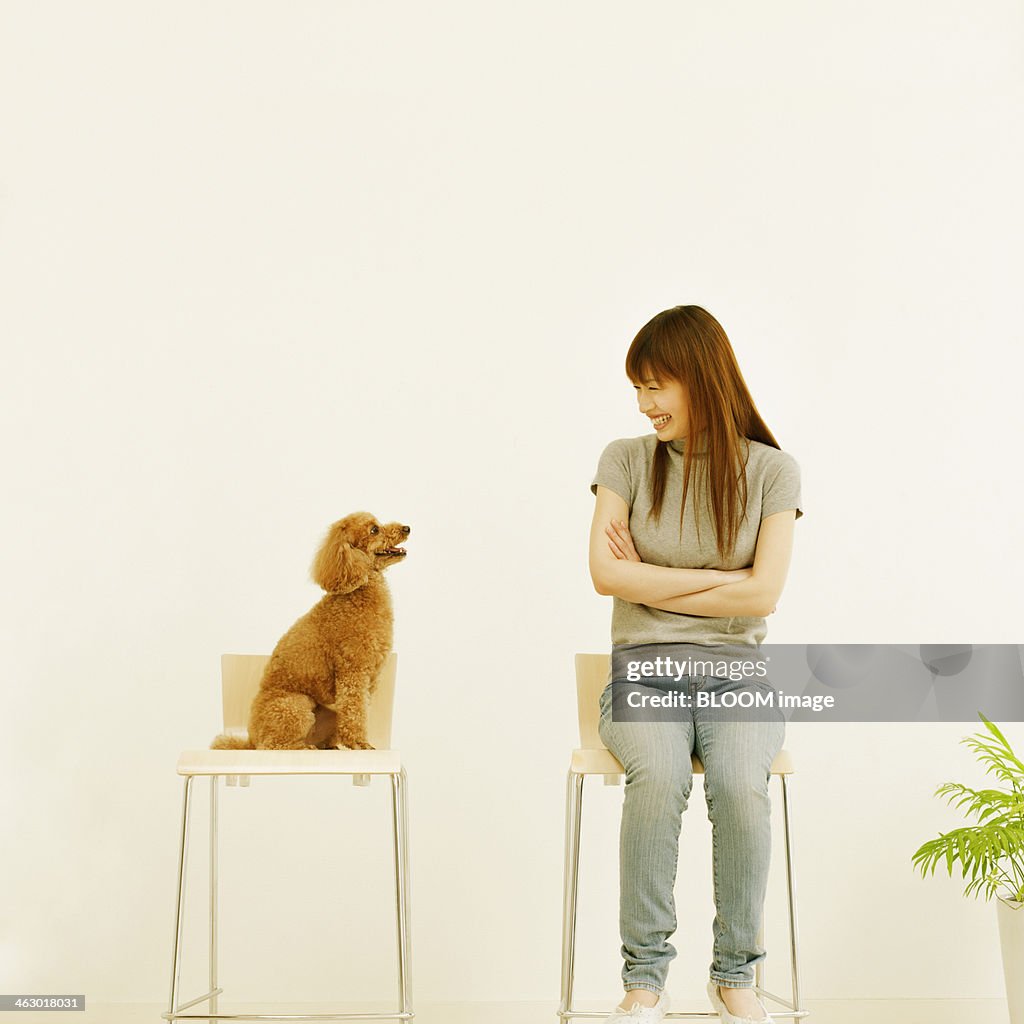 Woman And Dog Looking At Each Other