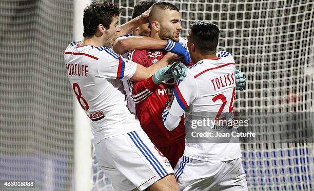 Goalkeeper of Lyon Anthony Lopes is congratulated by his teammates during the French Ligue 1 match between Olympique Lyonnais and Paris Saint-Germain...