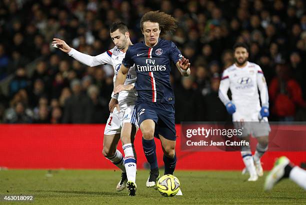 David Luiz of PSG and Maxime Gonalons of Lyon in action during the French Ligue 1 match between Olympique Lyonnais and Paris Saint-Germain FC at...