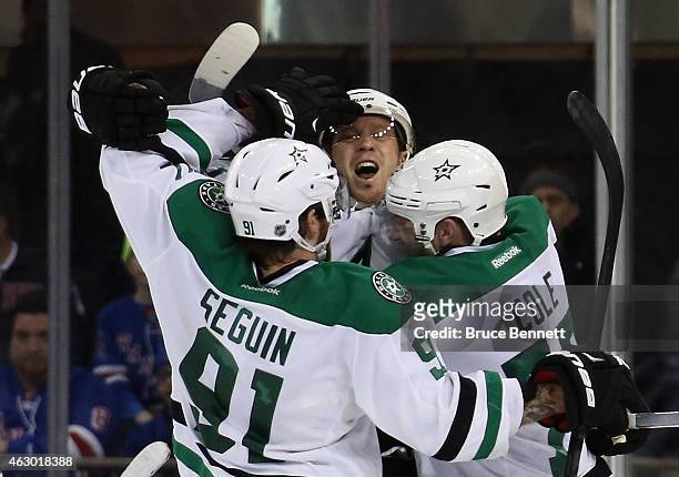 Ales Hemsky of the Dallas Stars celebrates his game winning goal in overtime against the New York Rangers with Tyler Seguin and Erik Cole at Madison...