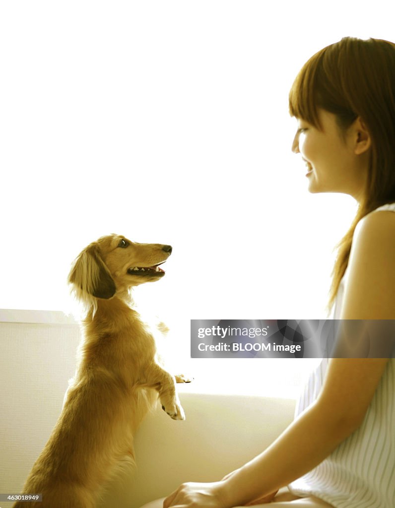 Woman With Miniature Dachshund