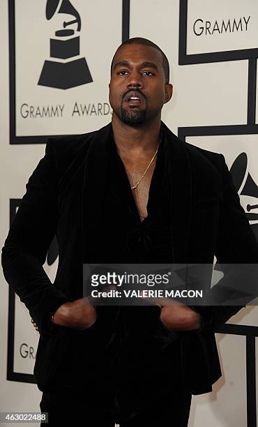 Twenty-one time Grammy holder and current nominee Kanye West arrives on the red carpet for the 57th Annual Grammy Awards in Los Angeles February 8,...
