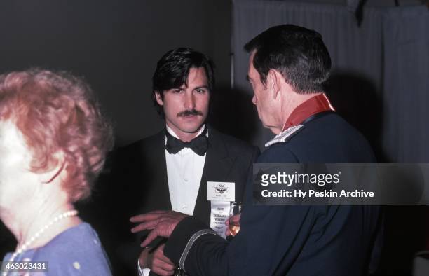 Apple co-founder Steve Jobs chats with a general at the Academy of Achievement Golden Plate Awards on June 24, 1982 in New Orleans, Louisiana.