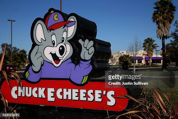Sign is posted in front of a Chuck E. Cheese restaurant on January 16, 2014 in Newark, California. CEC Entertainment, operator of 577 kid-themed...