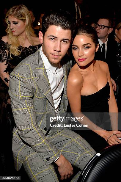 Singer Nick Jonas and actress Olivia Culpo during The 57th Annual GRAMMY Awards at the STAPLES Center on February 8, 2015 in Los Angeles, California.