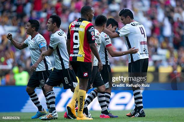 Enrique Perez of Atlas celebrates with teammates after scoring the second goal of the game during a match between Leones Negros and Atlas as part of...
