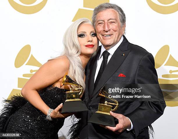 Singers Lady Gaga and Tony Bennett, winners of Best Traditional Pop Vocal Album for 'Cheek to Cheek,' pose in the press room during The 57th Annual...