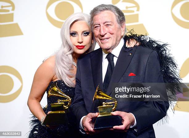 Singers Lady Gaga and Tony Bennett, winners of Best Traditional Pop Vocal Album for 'Cheek to Cheek,' pose in the press room during The 57th Annual...