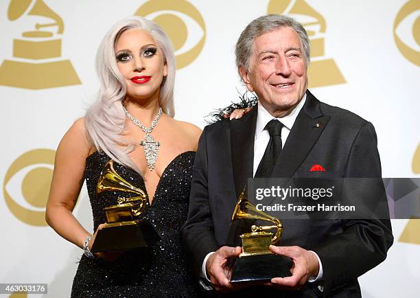 Singers Lady Gaga and Tony Bennett, winners of Best Traditional Pop Vocal Album for 'Cheek to Cheek,' pose in the press room during The 57th Annual...