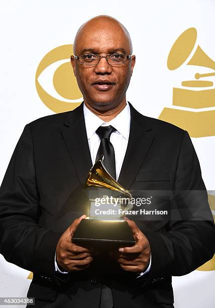 Musician Billy Childs, winner of Best Instrumental Arrangement Accompanying Vocalist for 'New York Tendaberry,' poses in the press room during The...