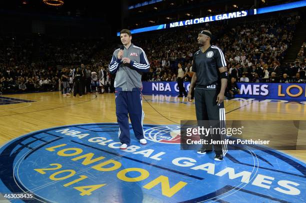 Kyle Korver of the Atlanta Hawks and Jason Terry of the Brooklyn Nets address the crowd before the game as part of the 2014 Global Games on January...