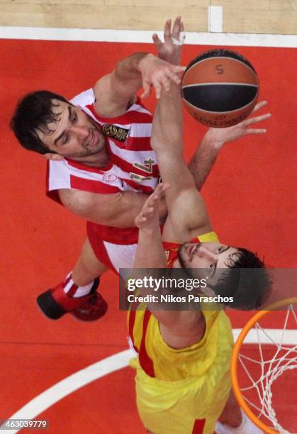 Mirza Begic, #14 of Olympiacos Piraeus in action during the 2013-2014 Turkish Airlines Euroleague Top 16 Date 3 game between Olympiacos Piraeus v FC...