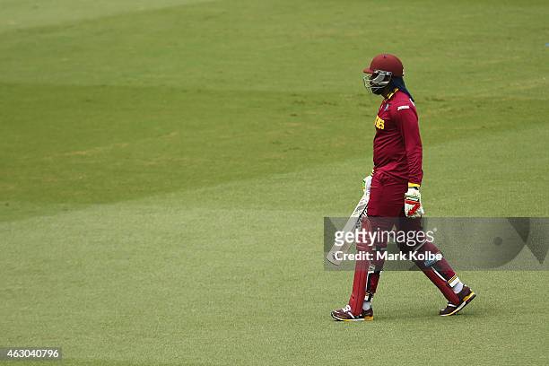 Chris Gayle of West Indies leaves the field after being dismissed first ball during the ICC Cricket World Cup warm up match between England and the...