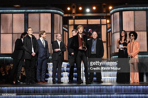Musician Beck accepts Album of the Year award from Prince onstage during The 57th Annual GRAMMY Awards at the STAPLES Center on February 8, 2015 in...