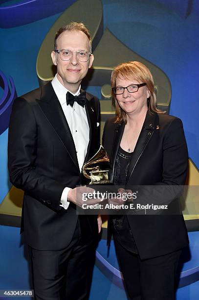 Winners for Best Historical Album, mastering engineer Michael Graves and Producer Cheryl Pawelski pose at the Premiere Ceremony during The 57th...