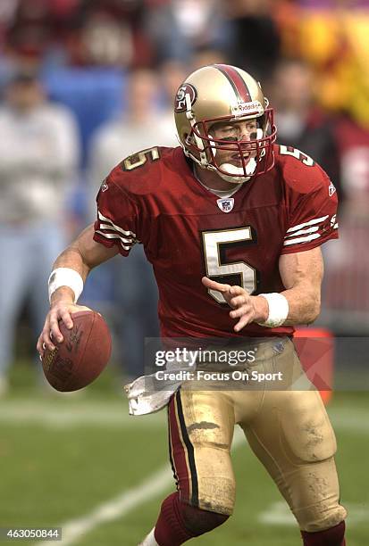 Jeff Garcia of the San Francisco 49ers scrambles away from the pressure against the Kansas City Chiefs during an NFL Football game November 10, 2002...